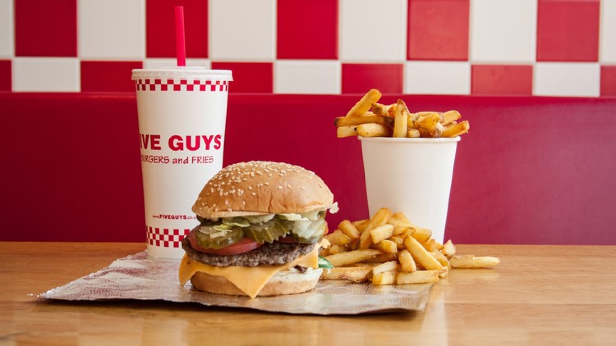 DOUBLE TREAT: SHELLEY SANDZER SERVES UP TWO NEW SITES FOR FIVE GUYS